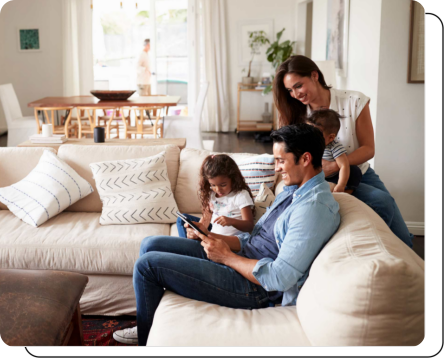 young-family-hanging-out-on-couch